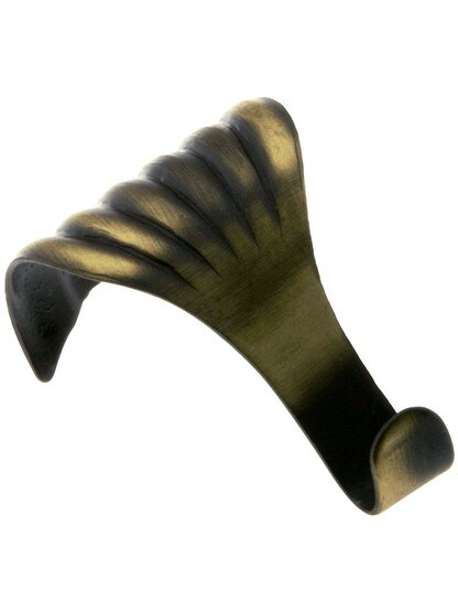 Streamline Picture Rail Hook in Antique Brass.